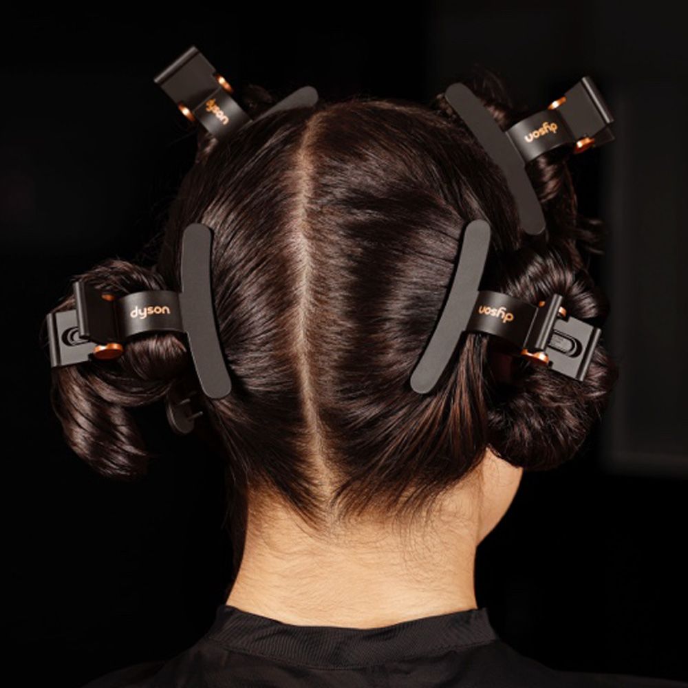 Model using Dyson Airwrap i.d. - wet to dry styling